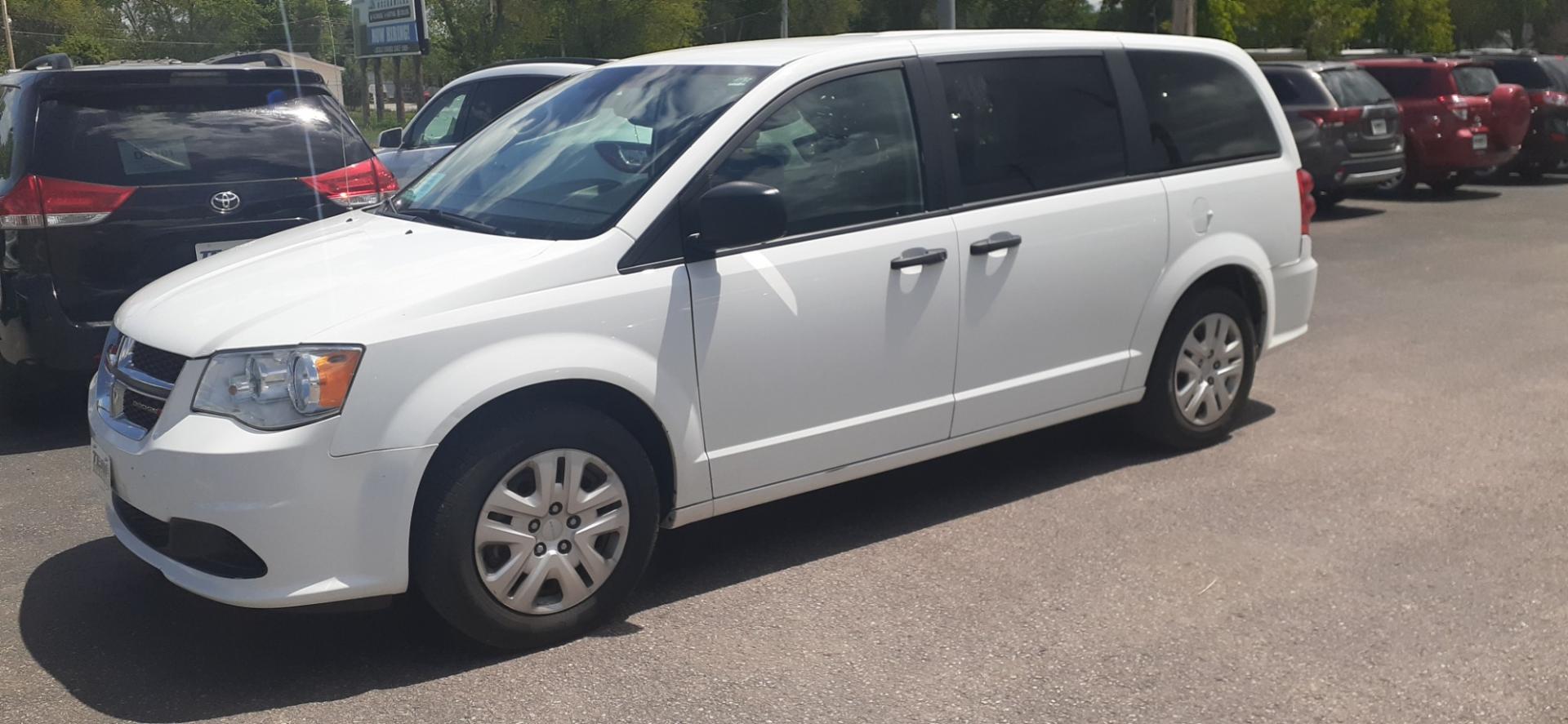 2019 Dodge Grand Caravan SE Plus (2C4RDGBG7KR) with an 3.6L V6 DOHC 24V engine, 6A transmission, located at 2015 Cambell Street, Rapid City, SD, 57701, (605) 342-8326, 44.066433, -103.191772 - CARFAX AVAILABLE - Photo#1